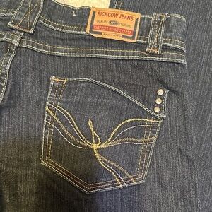 637.  Richcow Women's Mid rise Boot Cut Jeans - embroidered pockets dark Blue
